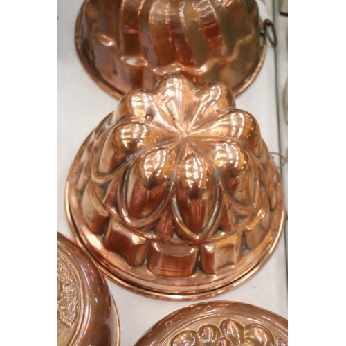 805 - FOUR COPPER JELLY MOULDS