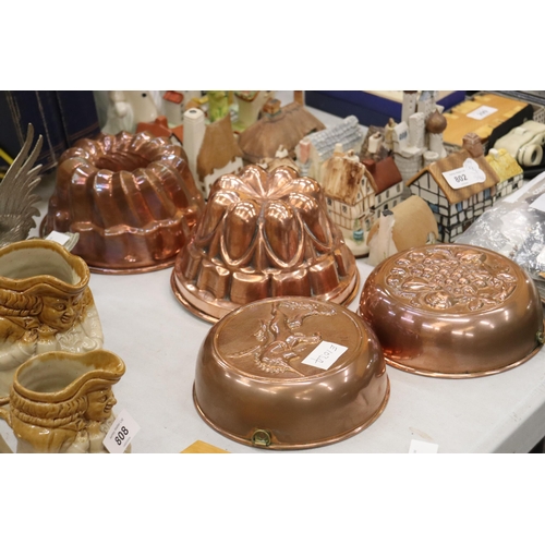 805 - FOUR COPPER JELLY MOULDS