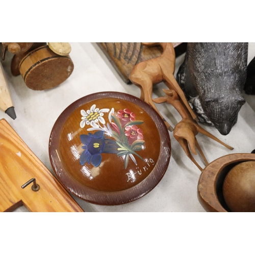 812 - A MIXED LOT TO INCLUDE A WOLF SCULPTURE HAND MADE IN CANADA, PAIR OF DUTCH CLOGS, WOOD CARVING, ETC.... 