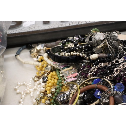 815 - A QUANTITY OF COSTUME JEWELLERY TO INCLUDE BANGLES,NECKLACES, WATCHES, ETC.,