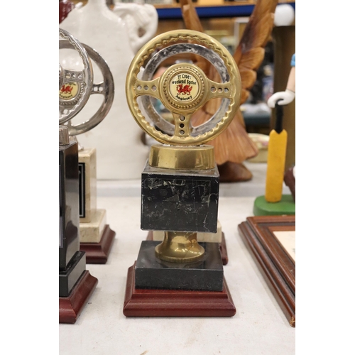 823 - FOUR QUALITY BRASS AND STEEL ANGLESEY CAR CLUB AWARDS