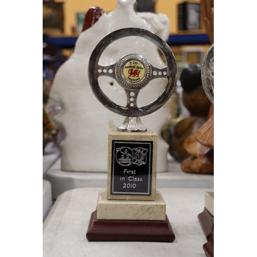 823 - FOUR QUALITY BRASS AND STEEL ANGLESEY CAR CLUB AWARDS