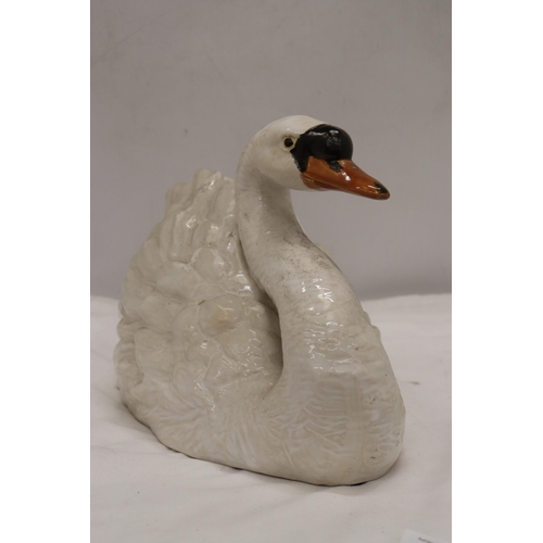 831 - A LARGE CERAMIC SWAN