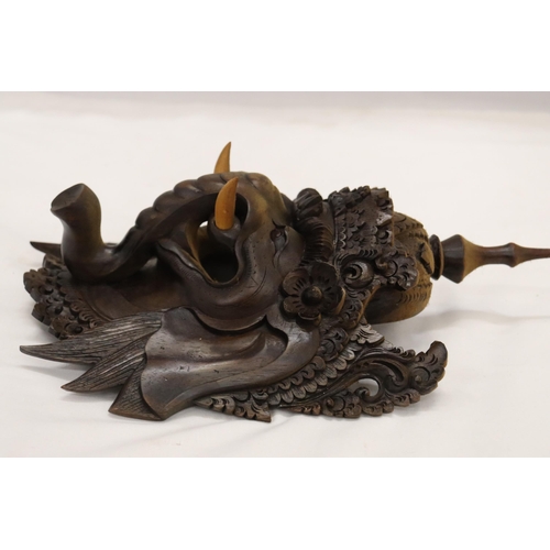 833 - A WOODEN INDONESIAN GANESH MASK