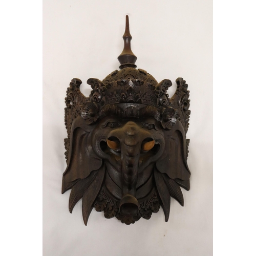 833 - A WOODEN INDONESIAN GANESH MASK