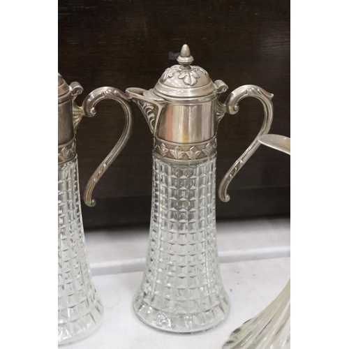 852 - TWO VINTAGE CLARET JUGS WITH SILVER PLATED TOPS PLUS A BELL BOTTOM DECANTER MISSING FINIAL