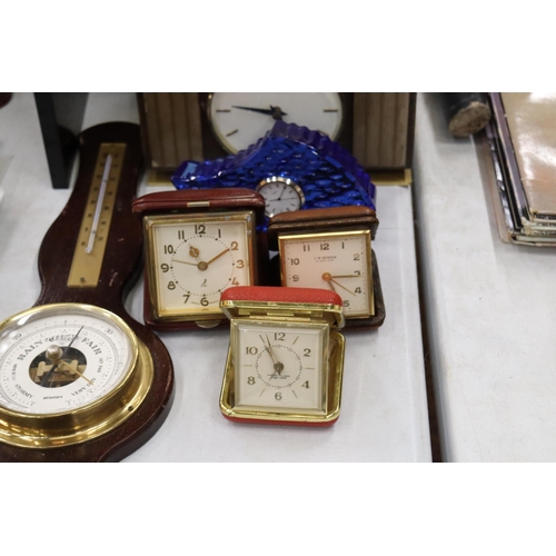 858 - SEVEN VINTAGE CLOCKS AND A BAROMETER