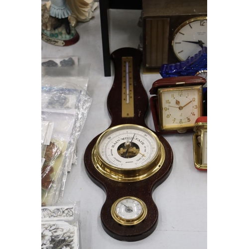 858 - SEVEN VINTAGE CLOCKS AND A BAROMETER