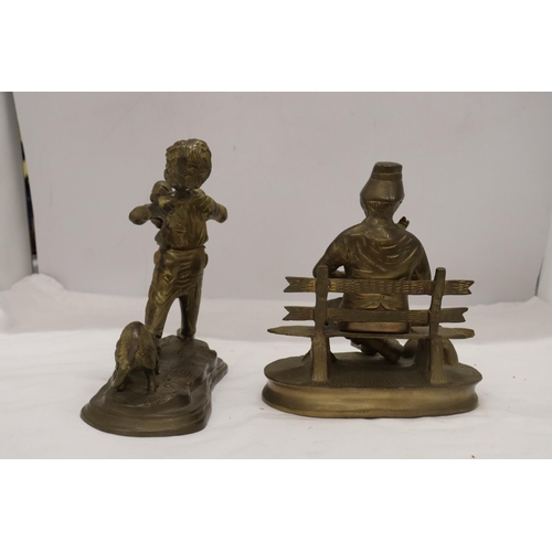 875 - A BRASS FIGURE OF A BOY WITH PUPPY DOGS, HEIGHT 20CM, WIDTH 20CM TOGETHER WITH A BRASS LADEL AND A B... 