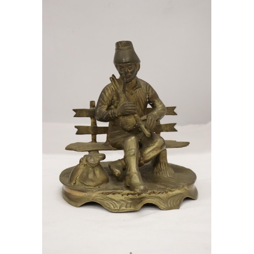 875 - A BRASS FIGURE OF A BOY WITH PUPPY DOGS, HEIGHT 20CM, WIDTH 20CM TOGETHER WITH A BRASS LADEL AND A B... 