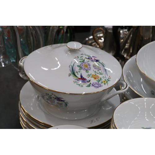 880 - A LARGE LIMOGES DINNER SERVICE WITH BIRDS OF PARADISE DESIGN TO INCLUDE, VARIOUS SIZES OF PLATES, A ... 