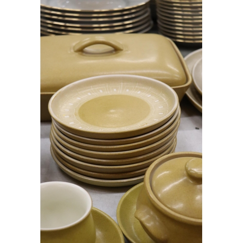 884 - A DENBY MUSTARD COLOURED DINNER SERVICE, TO INCLUDE VARIOUS SIZES OF PLATES, A CASSEROLE DISH, BOWLS... 