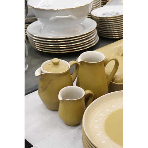 884 - A DENBY MUSTARD COLOURED DINNER SERVICE, TO INCLUDE VARIOUS SIZES OF PLATES, A CASSEROLE DISH, BOWLS... 