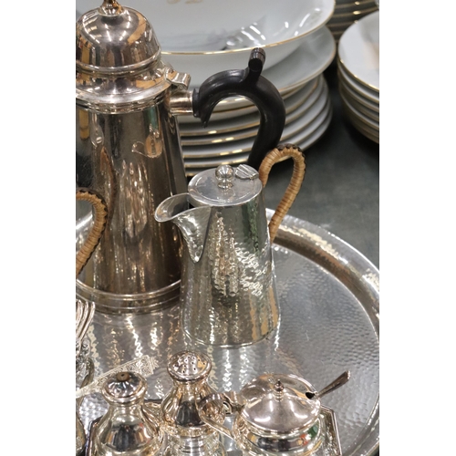 894 - A PEWTER TRAY, COFFEE POT AND HOT WATER JUG, PLUS A SILVER PLATED COFFEE POT, CRUET SET, MUSTARD POT... 