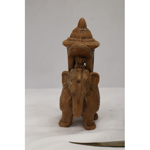 895 - A HARDWOOD CARVED ELEPHANT, STONE ELEPHANT, MISSING A LEG AND A BRASS KNIFE