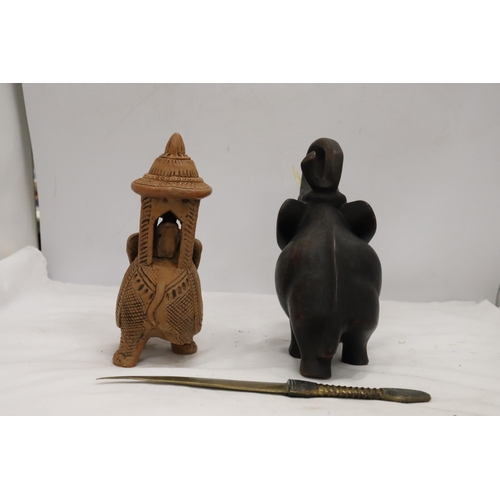 895 - A HARDWOOD CARVED ELEPHANT, STONE ELEPHANT, MISSING A LEG AND A BRASS KNIFE