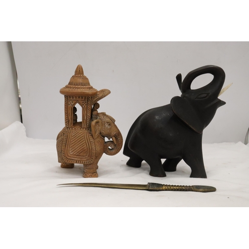 895 - A HARDWOOD CARVED ELEPHANT, STONE ELEPHANT, MISSING A LEG AND A BRASS KNIFE