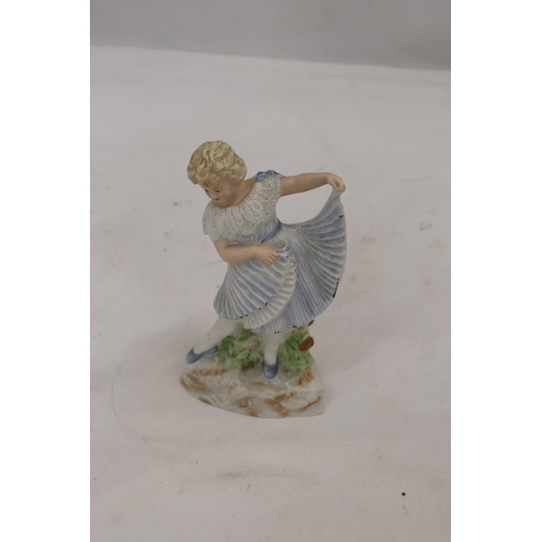 897 - A BISQUE FIGURE OF A YOUNG LADY, MARKED TO THE BASE