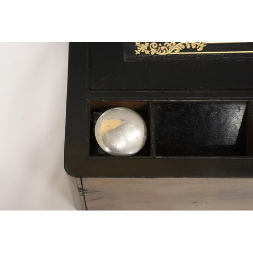 902 - A BRASS BOUND WRITING BOX WITH SECRET DRAWERS, LEATHER TOOLED SLOPE WITH ONE INKWELL