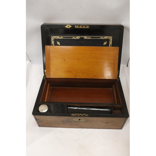 902 - A BRASS BOUND WRITING BOX WITH SECRET DRAWERS, LEATHER TOOLED SLOPE WITH ONE INKWELL