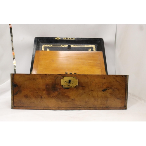 902 - A BRASS BOUND WRITING BOX WITH SECRET DRAWERS, LEATHER TOOLED SLOPE WITH ONE INKWELL