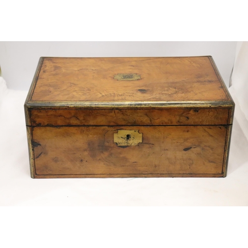 902 - A BRASS BOUND WRITING BOX WITH SECRET DRAWERS, LEATHER TOOLED SLOPE WITH ONE INKWELL