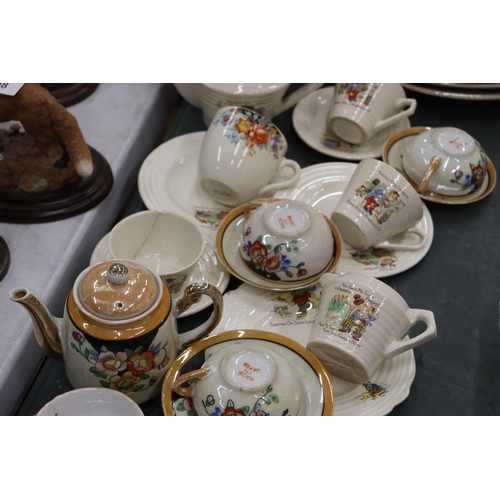 906 - AN ART DECO CHILD'S TEASET WITH CHILDREN'S CHARACTERS TO INCLUDE A TEAPOT, SUGAR BOWL, CREAM JUG, CU... 