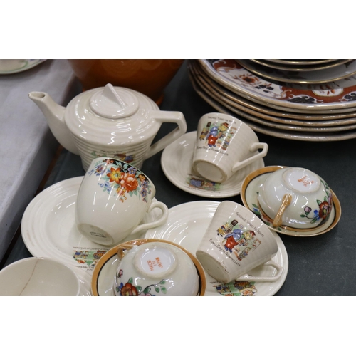 906 - AN ART DECO CHILD'S TEASET WITH CHILDREN'S CHARACTERS TO INCLUDE A TEAPOT, SUGAR BOWL, CREAM JUG, CU... 