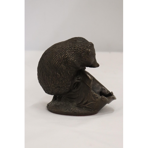 909 - A MODEL OF A HEDGEHOG, HEIGHT 12CM