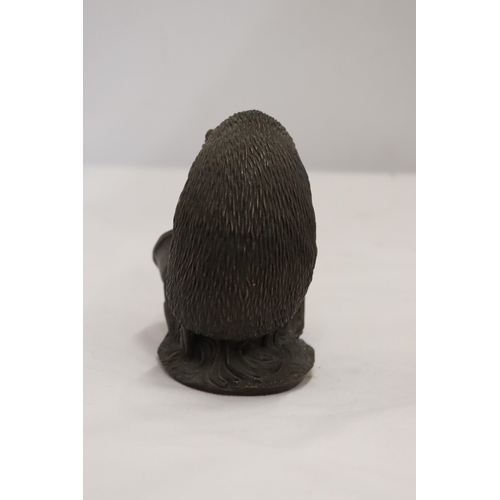 909 - A MODEL OF A HEDGEHOG, HEIGHT 12CM