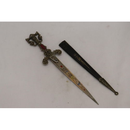 913 - A VINTAGE ORNATE LETTER OPENER/KNIFE IN A SHEATH