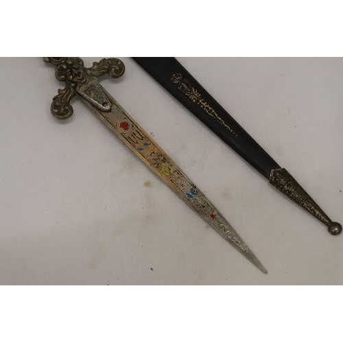 913 - A VINTAGE ORNATE LETTER OPENER/KNIFE IN A SHEATH