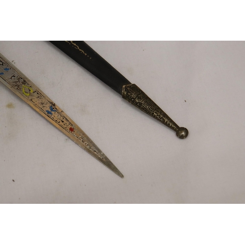 913 - A VINTAGE ORNATE LETTER OPENER/KNIFE IN A SHEATH