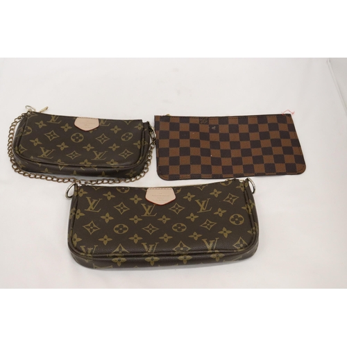 920 - THREE CLUTCH BAGS MARKED 'LOUIS VUITTON', NO PROVENANCE