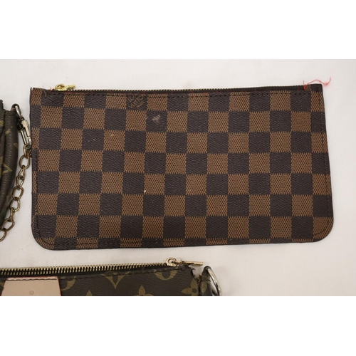 920 - THREE CLUTCH BAGS MARKED 'LOUIS VUITTON', NO PROVENANCE