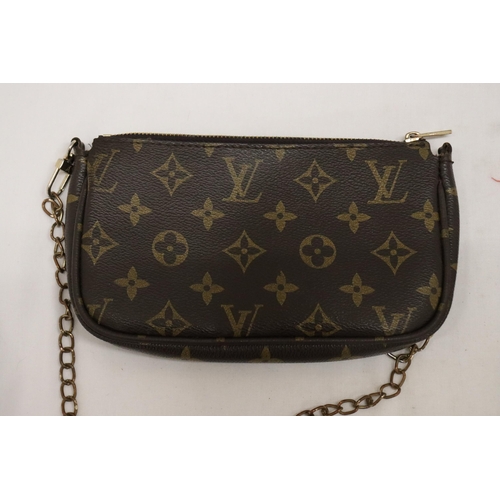 920 - THREE CLUTCH BAGS MARKED 'LOUIS VUITTON', NO PROVENANCE