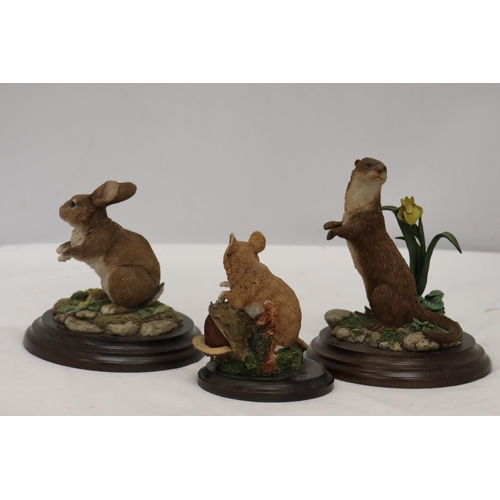 930 - THREE ANIMAL FIGURES ON PLINTHS BY ROYAL DOULTON