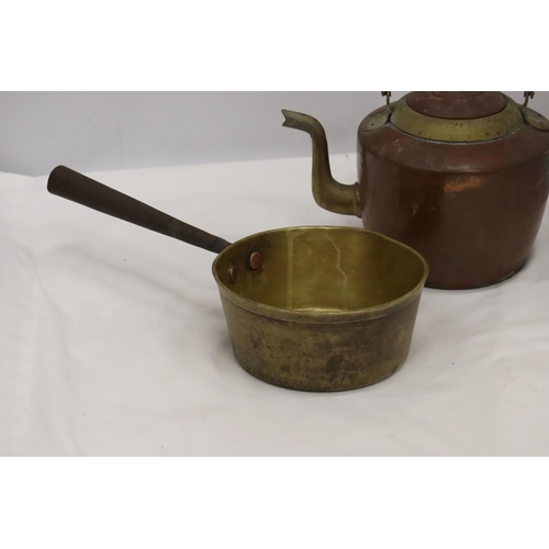 931 - A HEAVY BRASS SAUCEPAN AND A COPPER AND BRASS KETTLE