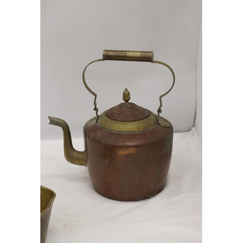 931 - A HEAVY BRASS SAUCEPAN AND A COPPER AND BRASS KETTLE