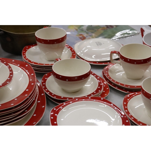 933 - A STYLECRAFT, 'MIDWINTER', STAFFORDSHIRE RED AND WHITE TEASET TO INCLUDE PLATES, CUPS AND SAUCERS PL... 