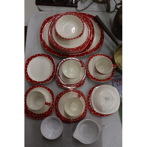 933 - A STYLECRAFT, 'MIDWINTER', STAFFORDSHIRE RED AND WHITE TEASET TO INCLUDE PLATES, CUPS AND SAUCERS PL... 