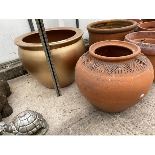 1666 - A TERRACOTTA PLANTER AND A FURTHER GILT TERRACOTTA PLANTER