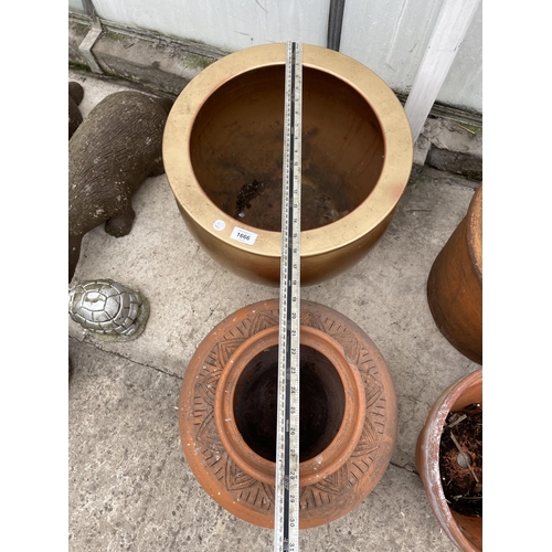 1666 - A TERRACOTTA PLANTER AND A FURTHER GILT TERRACOTTA PLANTER