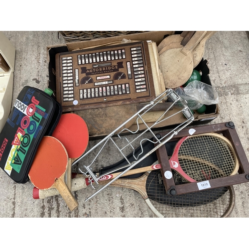 1810 - AN ASSORTMENT OF ITEMS TO INCLUDE A LARGE WICKER LOG BASKET, TENNIS RACKETS AND A VINTAGE AUTOBRIDGE... 