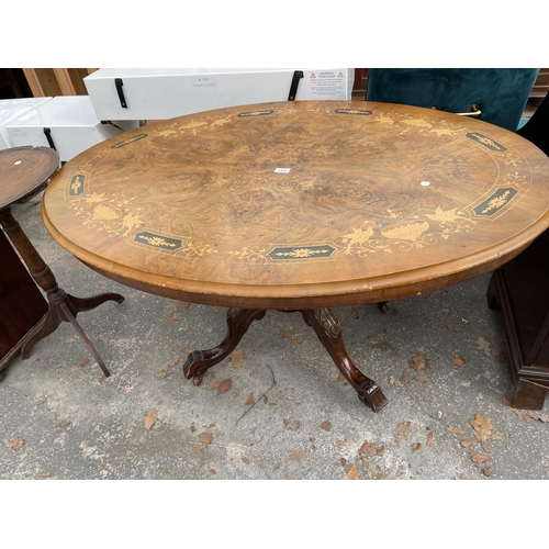 2899 - A VICTORIAN WALNUT AND INLAID OVAL TILT TOP TABLE ON FOUR TURNED SUPPORTS AND CENTRAL COLUMN 52