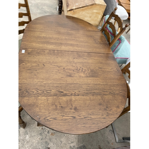 2905 - AN OAK EXTENDING DINING TABLE 59