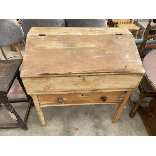 2906 - A VICTORIAN PINE CLERKS DESK WITH SLOPING HINGED FLAP AND SINGLE DRAWER 36