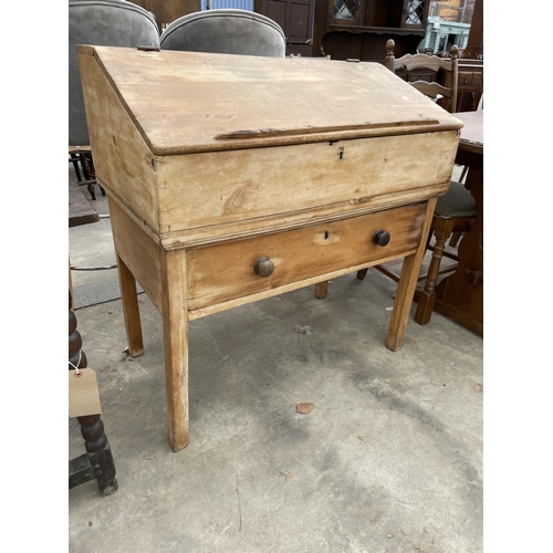 2906 - A VICTORIAN PINE CLERKS DESK WITH SLOPING HINGED FLAP AND SINGLE DRAWER 36