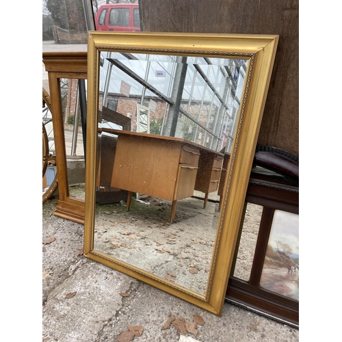 2976 - A MODERN GILT FRAMED WALL MIRROR 40