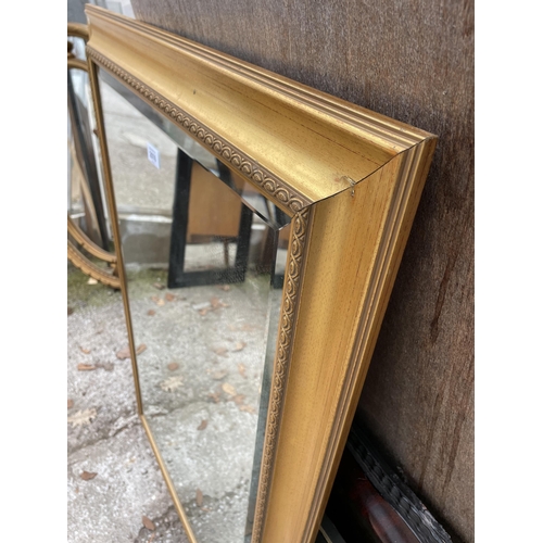 2976 - A MODERN GILT FRAMED WALL MIRROR 40